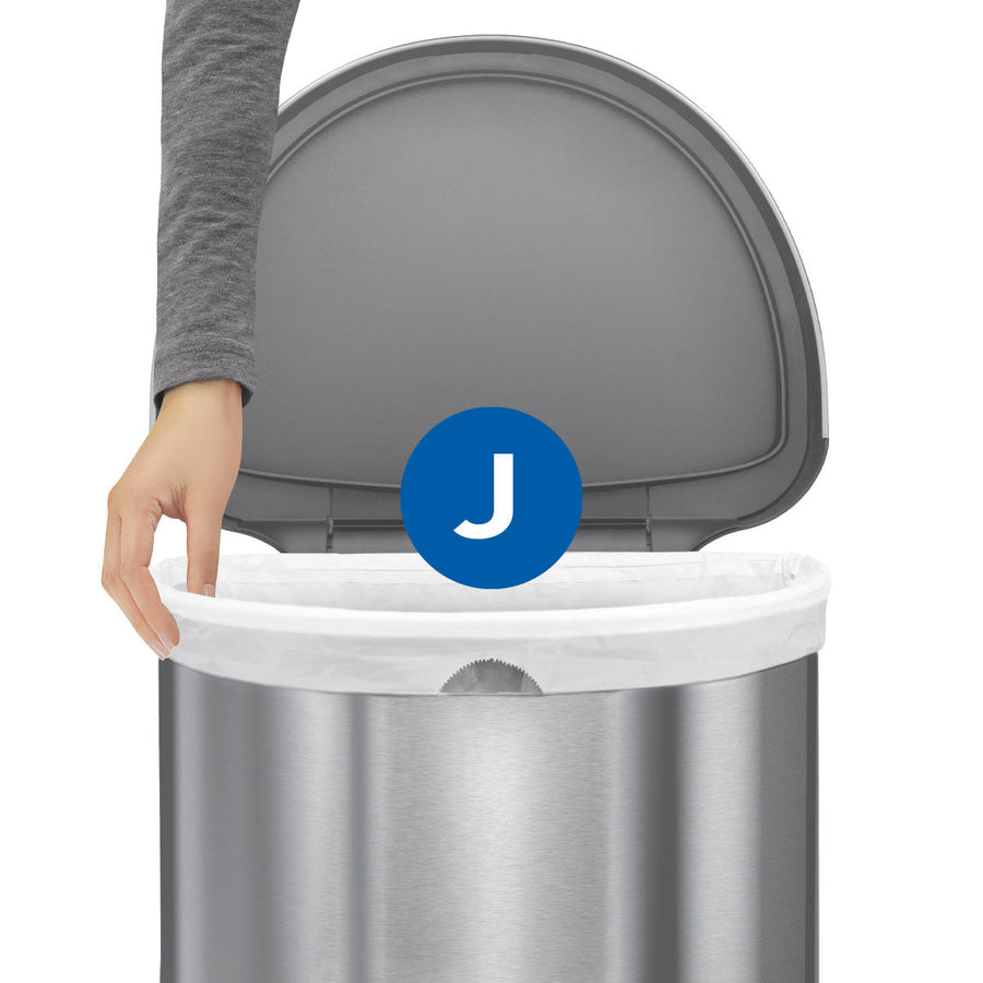 Detail view of Simplehuman Code J Custom Fit Liner (white) securing tightly in a brushed stainless steel can for a non-slip fit.