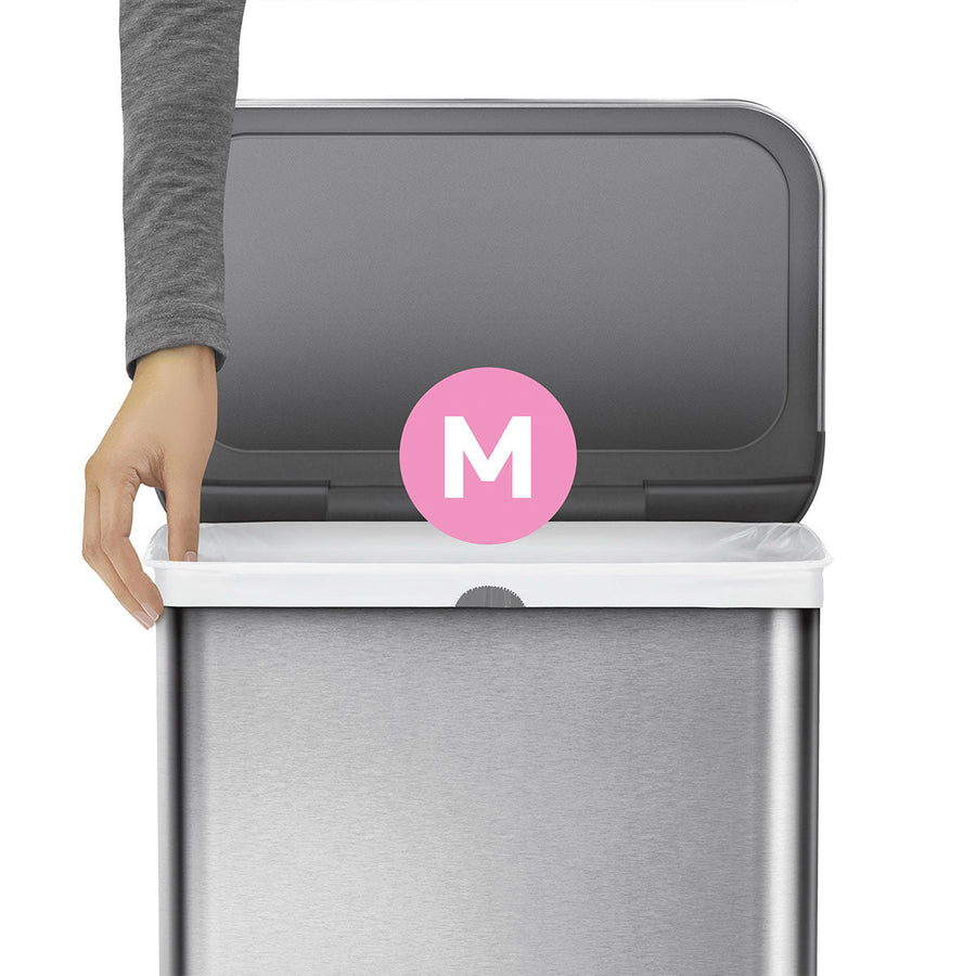 Close-up of Simplehuman Code M white liner being secured in Brushed Stainless Steel can, showing perfect custom fit.